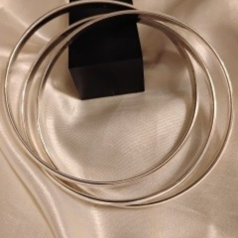 TRIPLE SILVER TONE INTERLOCKING BANGLE BRACELETS